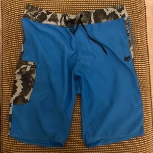 VGUC fox board shorts size 32 blue/camo